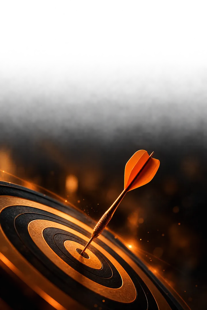 A dart in the bullseye of a target